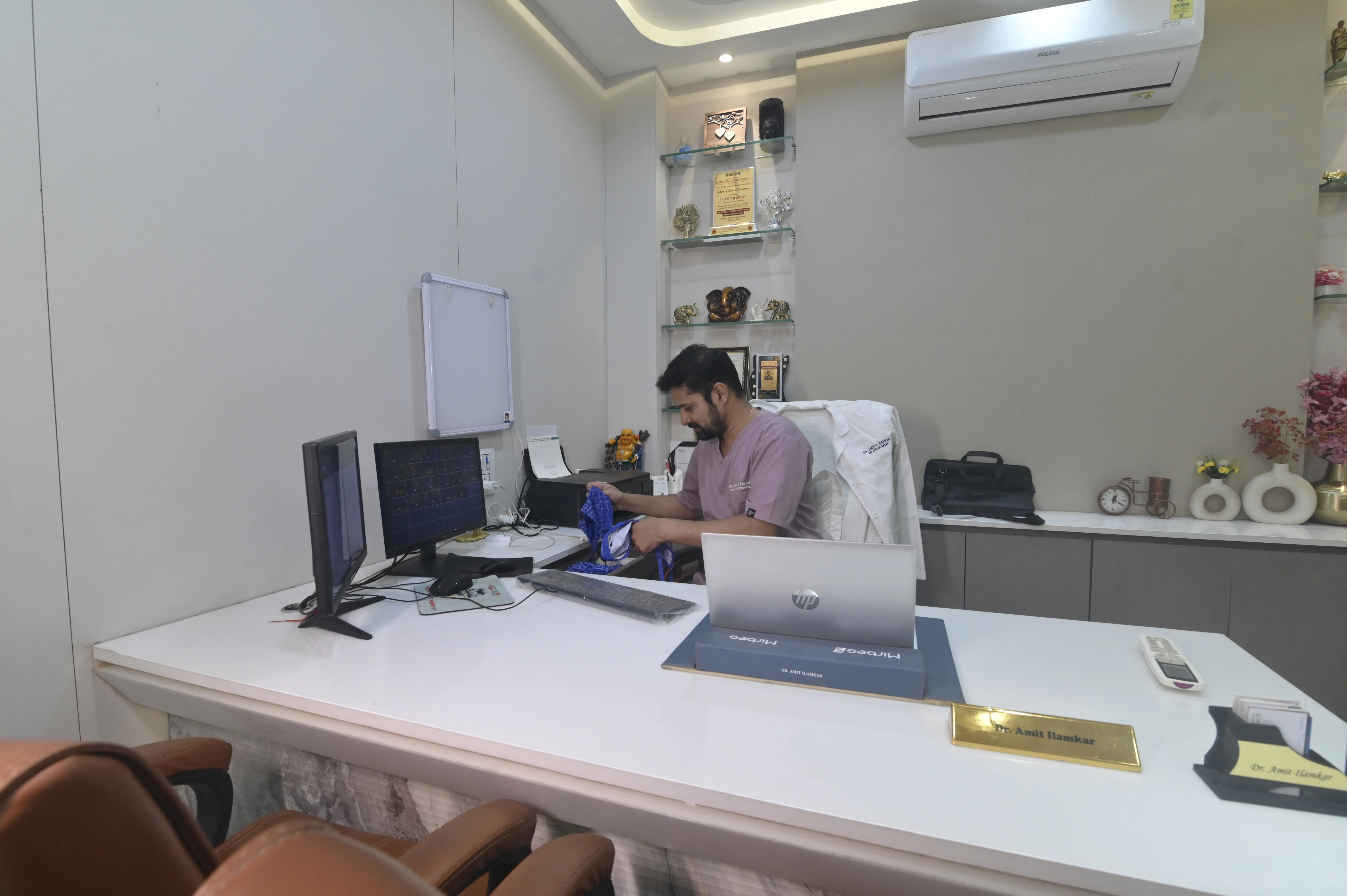 Dr. Amit Ilamkar at consultation desk